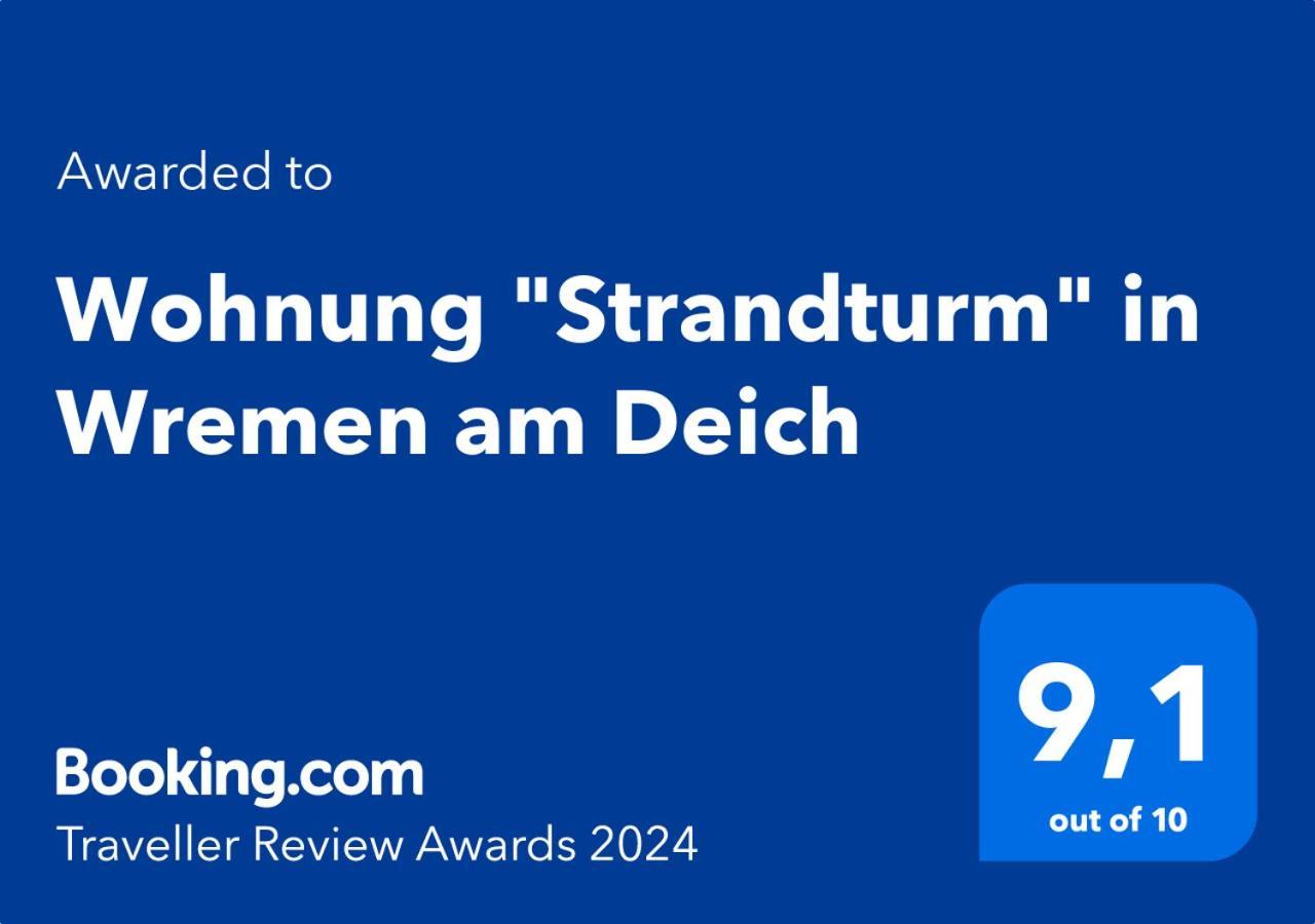 Wohnung "Strandturm" In Wremen Am Deich Bagian luar foto